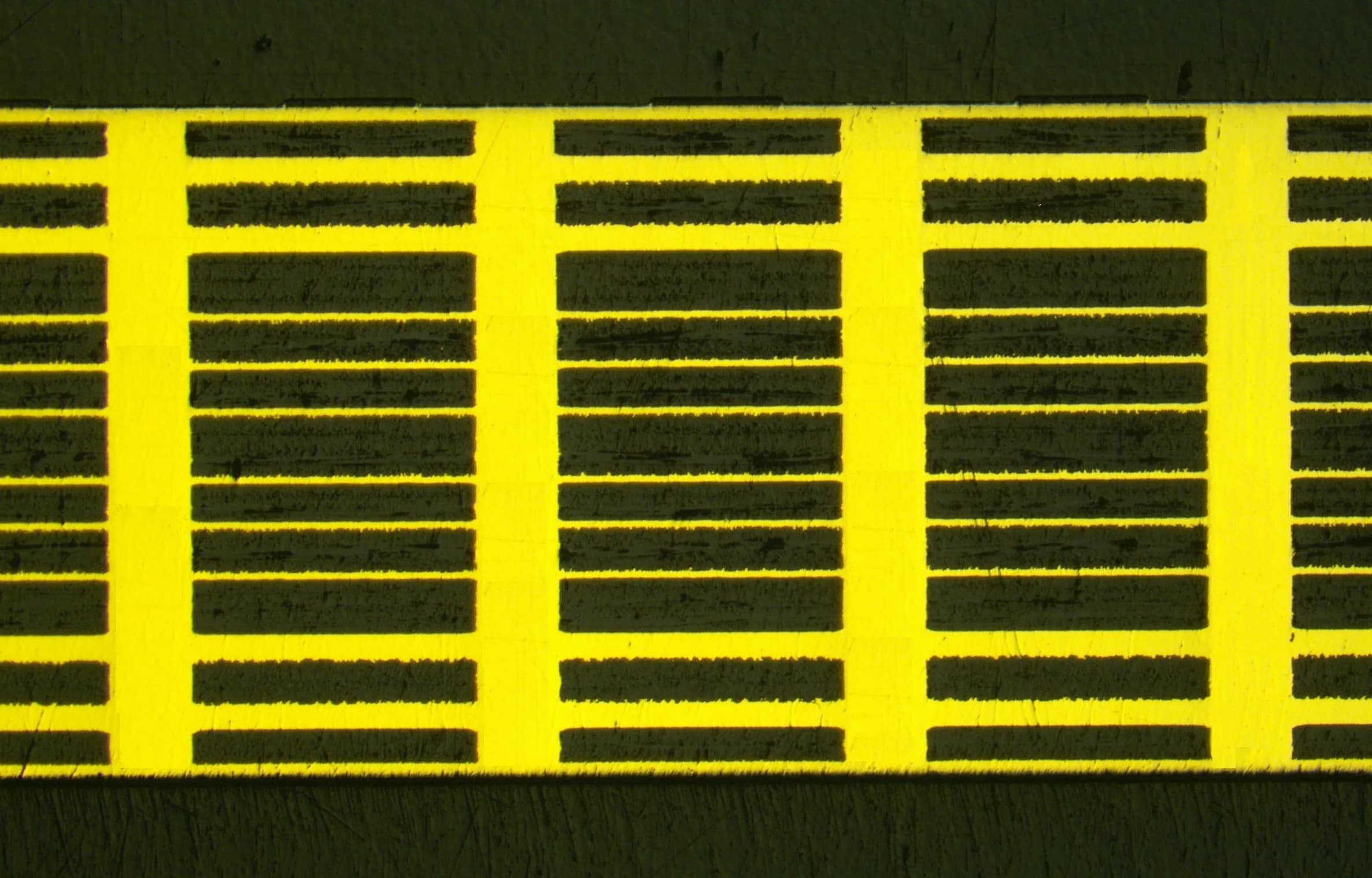 Macro cross-section view of precision copper-filled PCB vias showing consistent fill uniformity and via geometry across multiple columns, supporting IPC Class 3 reliability requirements.