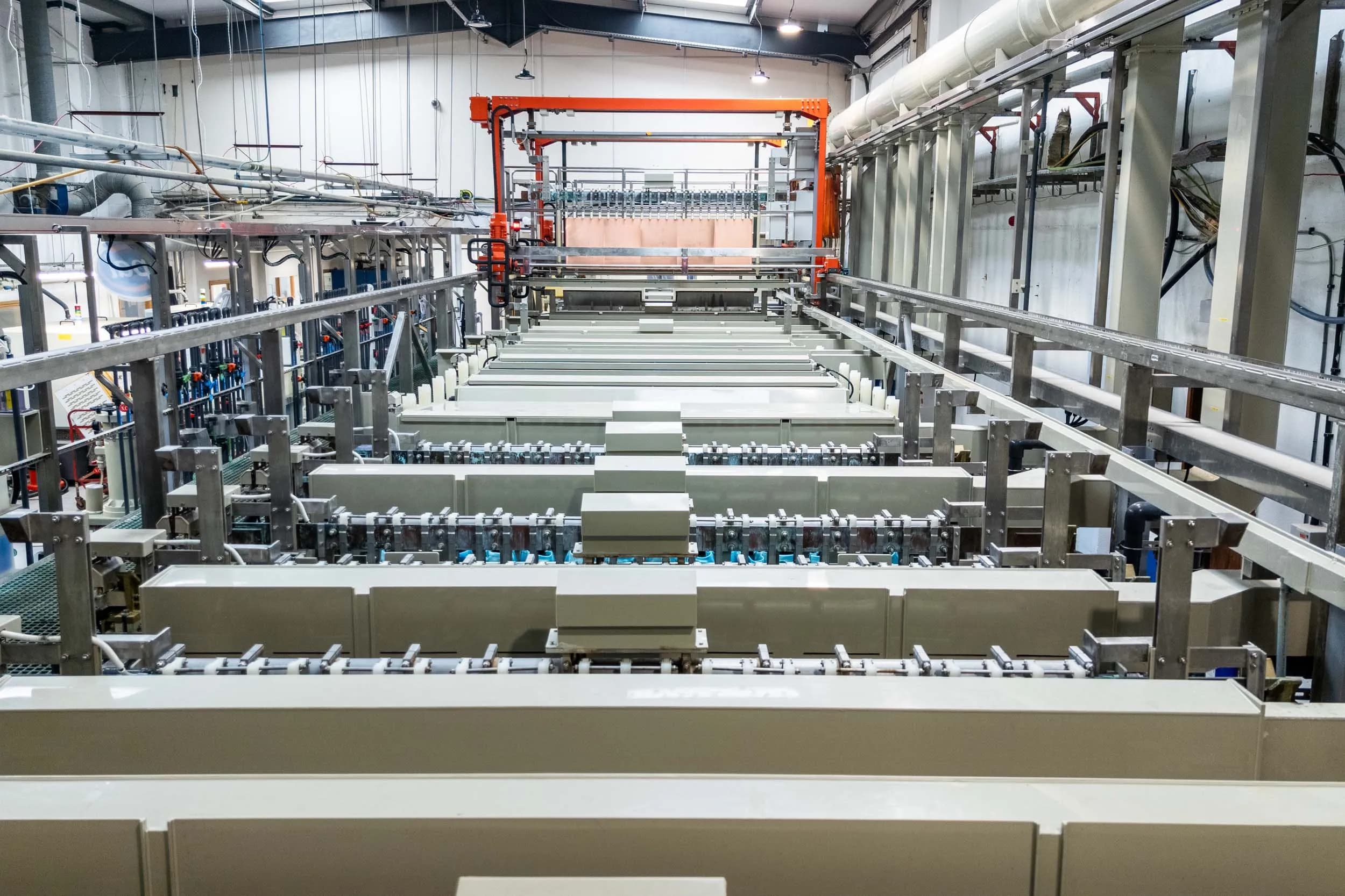 An automated horizontal PCB wet processing and electroplating line at Exception PCB UK facility.